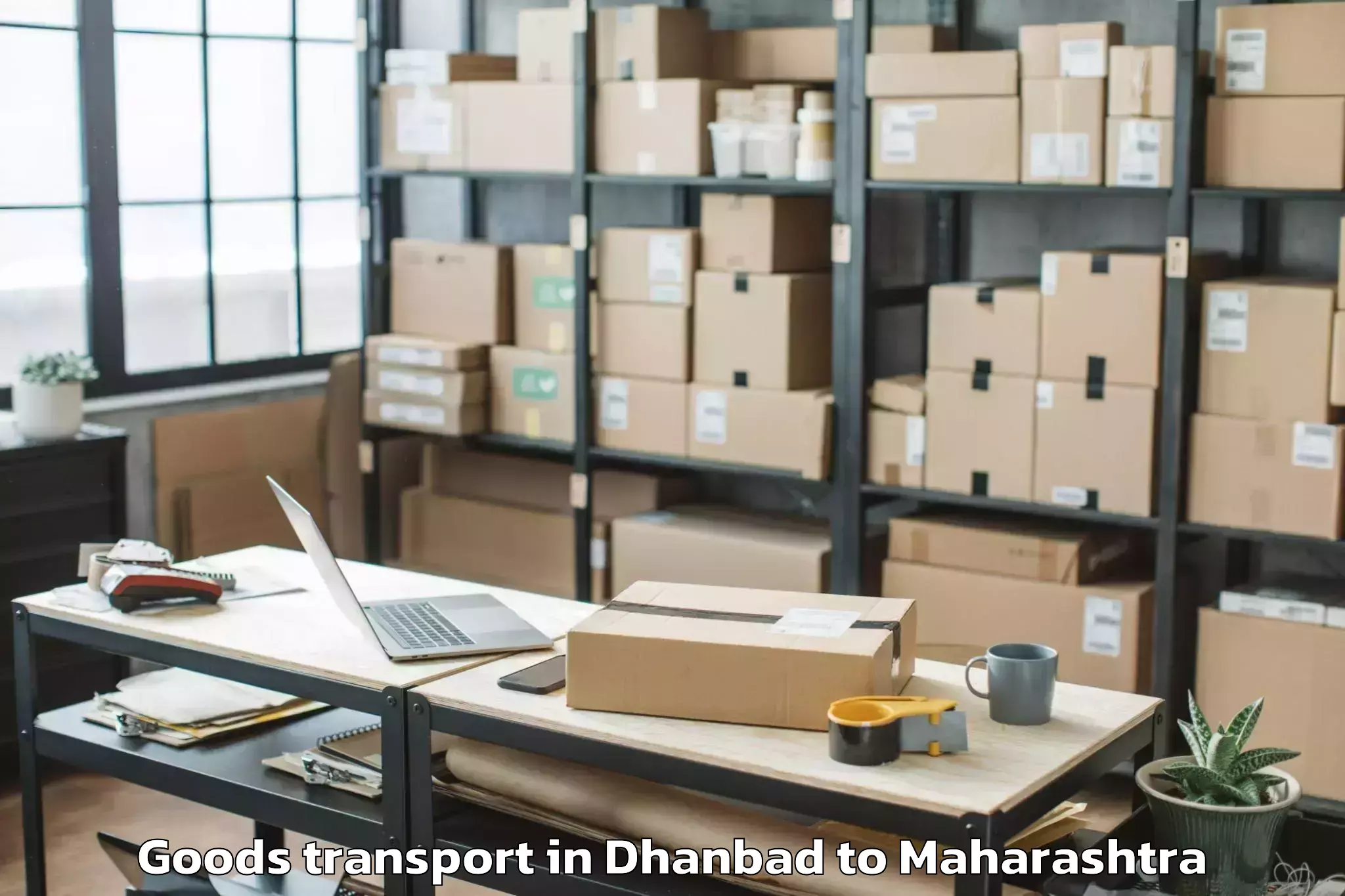 Top Dhanbad to Faizpur Goods Transport Available